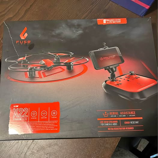 Quadcopter drone packaging box with X22 and controller illustration
