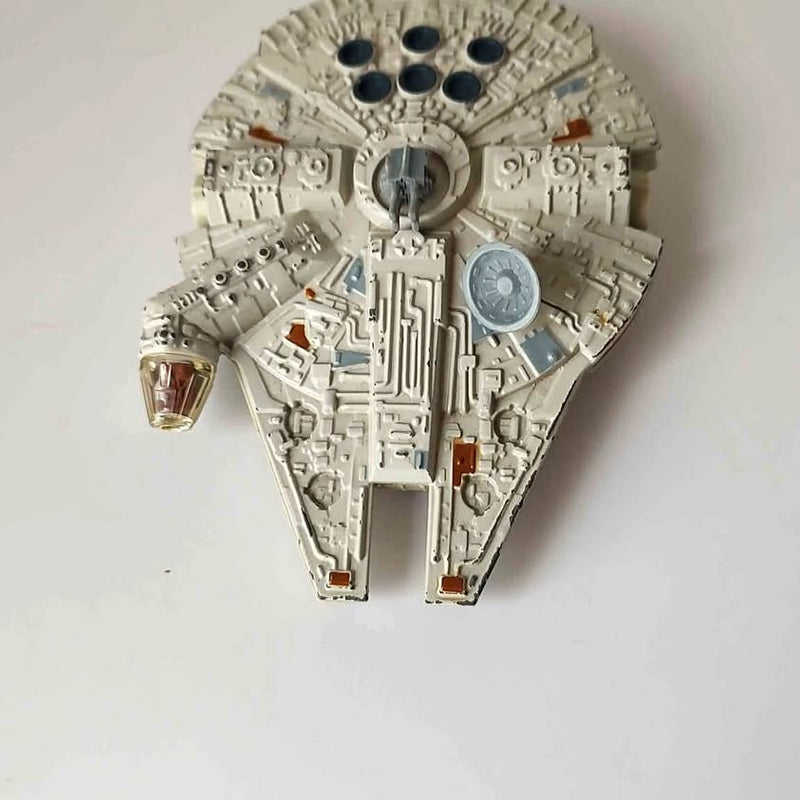 Diecast spaceship model, light gray with mechanical panel details and round top