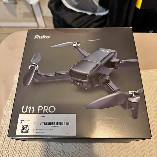 Roku U11 Pro quadcopter drone with folded propellers in retail box