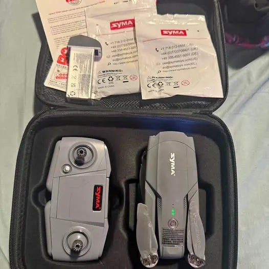 SYMA X500 Pro drone with controller in carrying case, grey