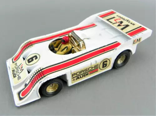 Diecast race car toy, white and red stripes, Porsche 6, front quarter view