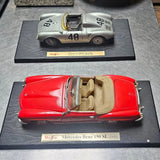 Red and silver diecast cars, front views on display stands
