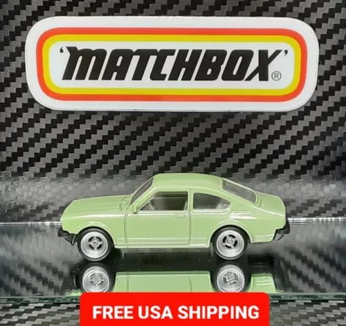 Matchbox 1/64 diecast car, light green Opel Kadett C with white wheels