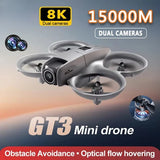 Mini quadcopter drone with dual cameras, grey body, four propellers, remote control
