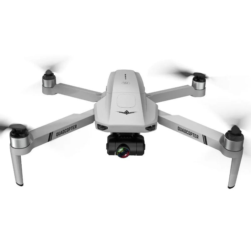 White quadcopter drone with four propellers and front camera gimbal