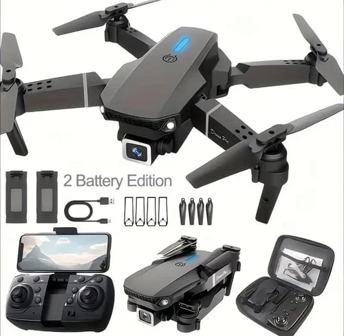 Foldable quadcopter drone with remote controller, battery pack, and accessories