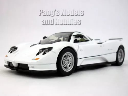 White 1/24 scale diecast sports car model, front three-quarter view.