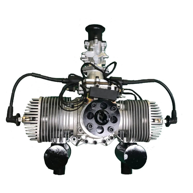 Small jet fuel drone engine with black hoses, silver cylinder, and twin intake ports