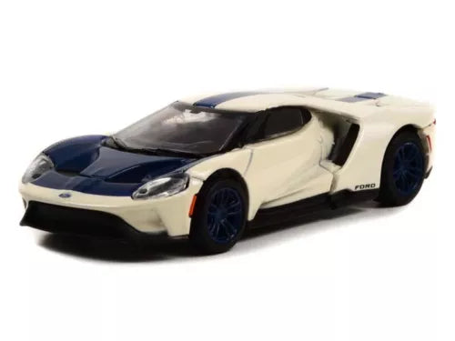 Ford GT diecast model car, cream body with dark blue hood, black front splitter, blue wheels