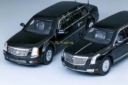 Black diecast metal luxury limo car model, front view with chrome grille