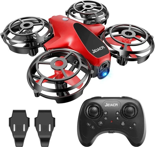 Red mini quadcopter drone with LED, four rotors and handheld controller
