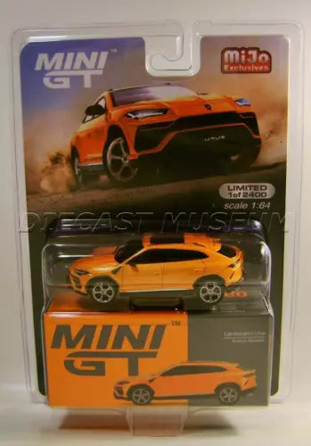 Die-cast Lamborghini Urus SUV model car in orange with black hood