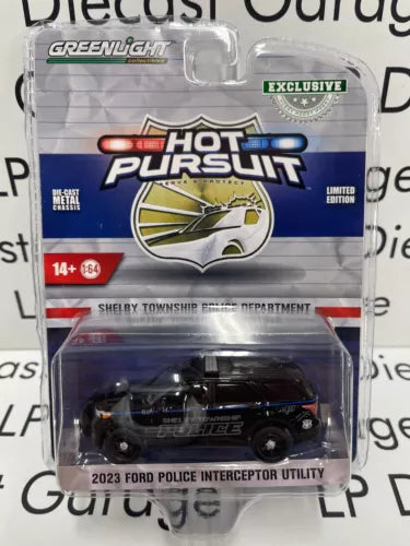 1:64 die-cast police car toy in box, black 2023 Ford interceptor utility
