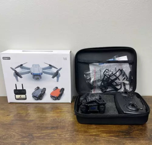 Foldable quadcopter drone kit in zip case with controller and batteries