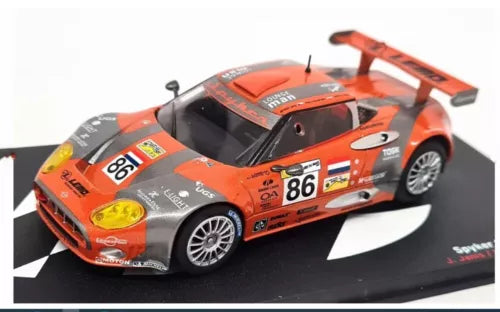1:43 diecast race car model, orange and black with #86 decal and rear wing
