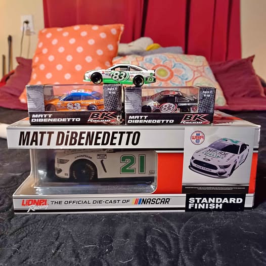 Diecast race car model boxes with Matt DiBenedetto branding