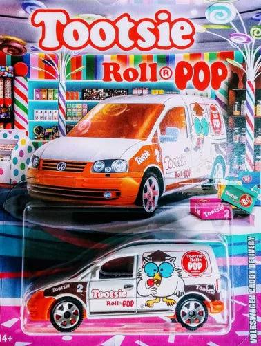 Orange and white VW Caddy diecast toy car with Tootsie Roll Pop decals