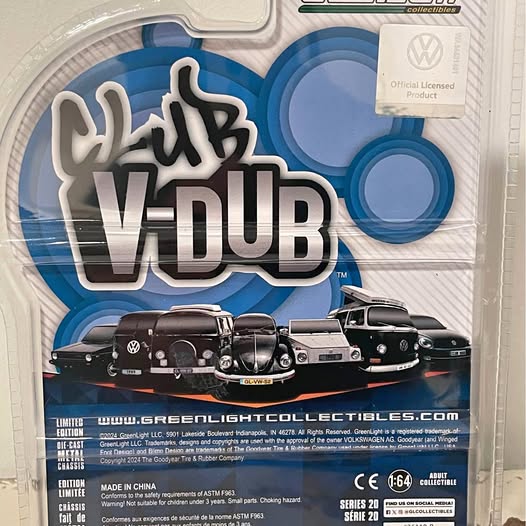 Diecast toy car set in blue blister packaging with VW logo and multiple cars