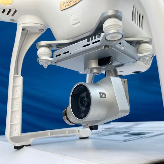 Grey drone with 4K camera gimbal and front lens