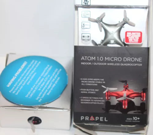 Micro wireless quadrocopter drone in retail box with controller and spare parts, blue case
