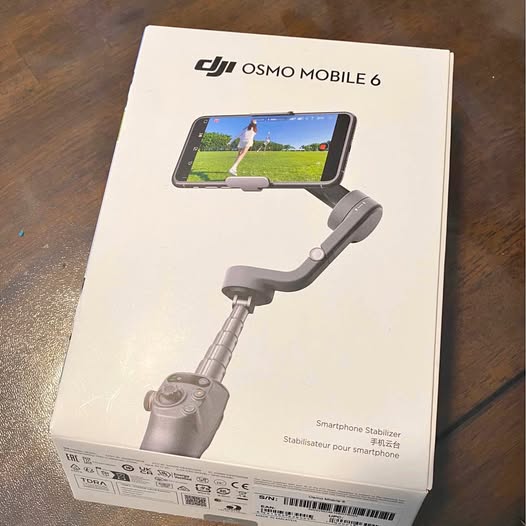 DJI Osmo Mobile 6 smartphone gimbal stabilizer box with handle and phone clamp