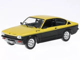 Yellow and black coupe diecast model car with chrome wheels and GTE decals