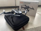 RC quadcopter drone in black zippered carrying case