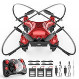 Red mini quadcopter drone with four propellers and remote controller kit
