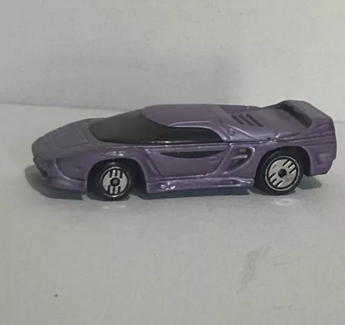 Purple collectible diecast car with black hood stripe and multi-spoke wheels, side view