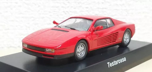 Red diecast sports car model with front three-quarter view and black front bumper