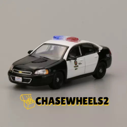 1:64 LAPD police car diecast model, black and white, front three-quarter view