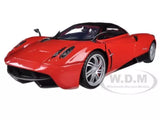 Red diecast supercar model with front three-quarter view and silver wheels.