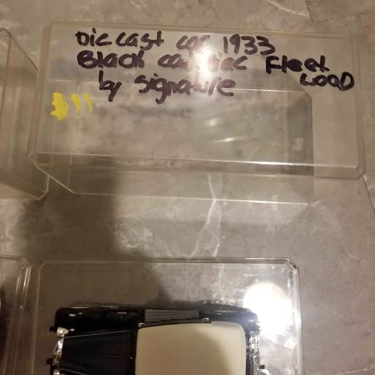 Die-cast model in clear plastic display box, black finish