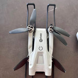 CONTIXO drone with foldable white body and gray propellers, front view