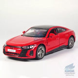 Red 1/36 scale diecast model car, front three-quarter view with black wheels