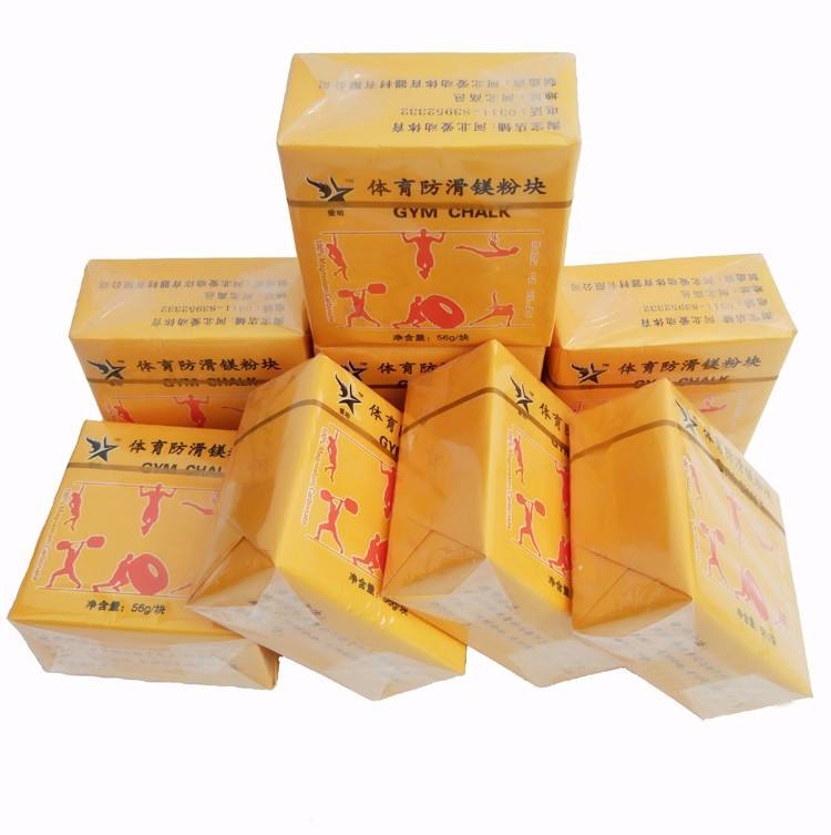 Gym chalk blocks in yellow/orange boxes for sports training
