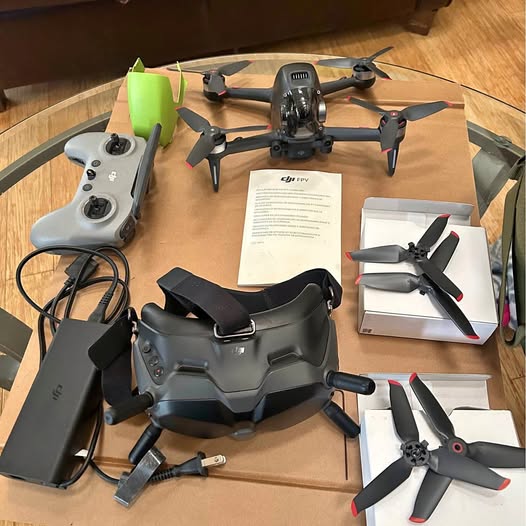 DJI FPV drone explorer combo with controller and spare propellers