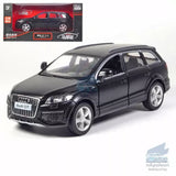 Black Audi Q7 diecast SUV model car with front grille and headlights