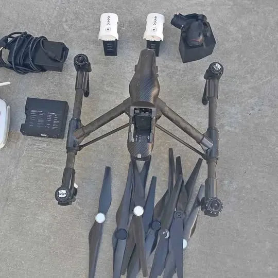 DJI Inspire drone with four arms and mounted cameras, shown from top view