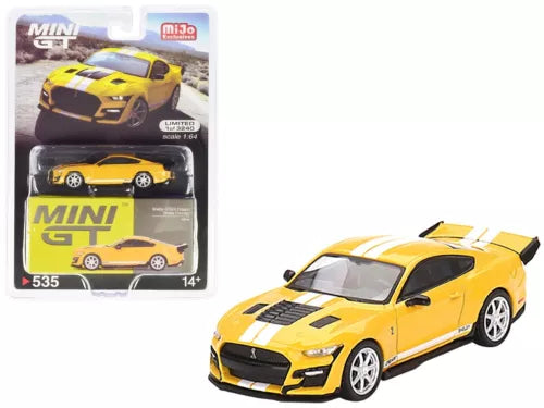 Yellow diecast model car with white racing stripes, front 3/4 view