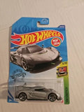 Hot Wheels Exotics diecast car in unopened blister pack, gray sports car
