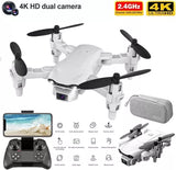 White folding quadcopter drone with dual cameras, remote controller and carrying case