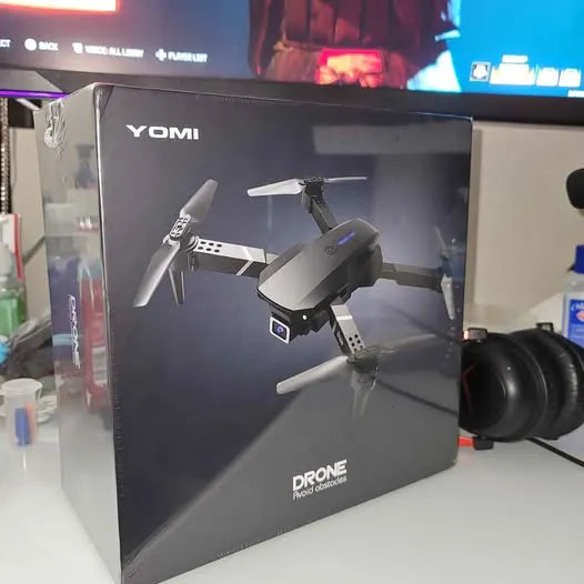 Drone retail box with YOMI logo and quadcopter illustration