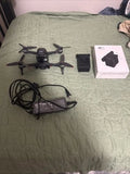 DJI FPV camera drone kit with quadcopter, goggles, cables and box