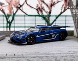 Blue diecast sports car model with black wheels, side view