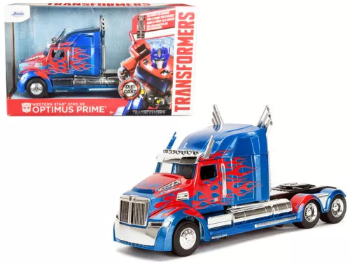 Transformers Optimus Prime diecast truck model, blue and red graffiti cab with chrome grille
