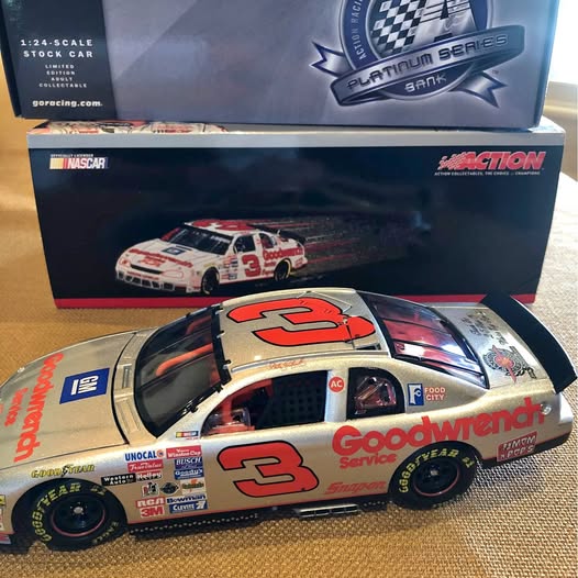 NASCAR diecast race car with #3 on hood, white and black body, sponsor decals