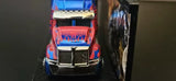 Diecast truck front cab with chrome grille and red paint