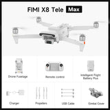 Quadcopter drone with camera, white body, four foldable propellers; remote and accessories.