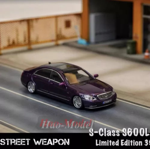 Purple diecast sedan model car with chrome grille, street weapon limited edition